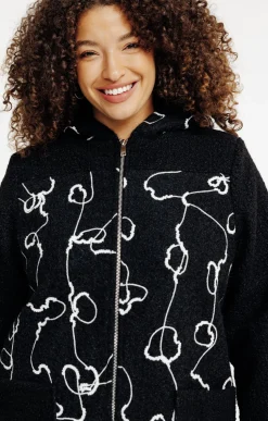 Manteau fantaisie en bouclette