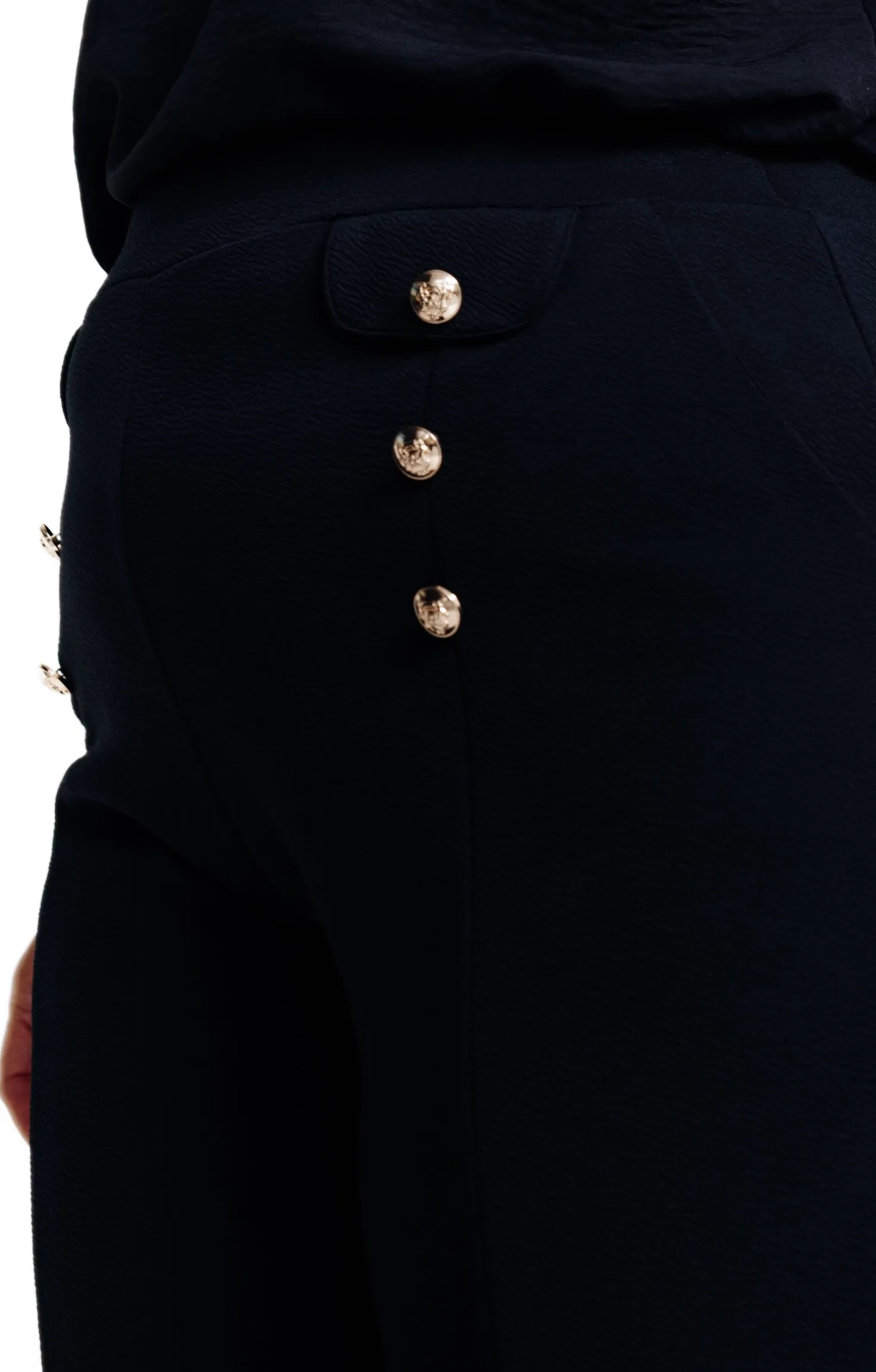 Pantalon chic à boutons