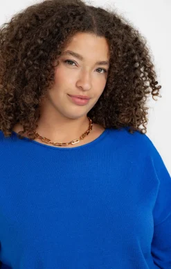 Pull avec boutons au dos