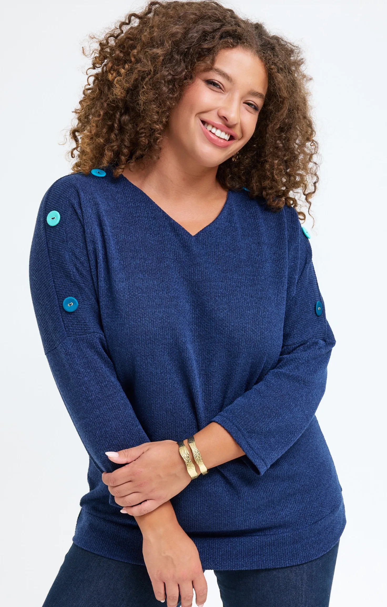 Pull avec boutons fantaisies